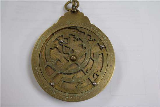 An Islamic brass astrolabe